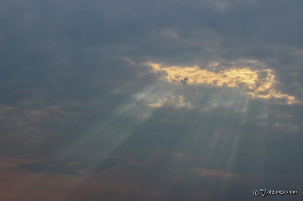 Sky HD wallpapers. Heavenly light struggling through thick clouds. 
